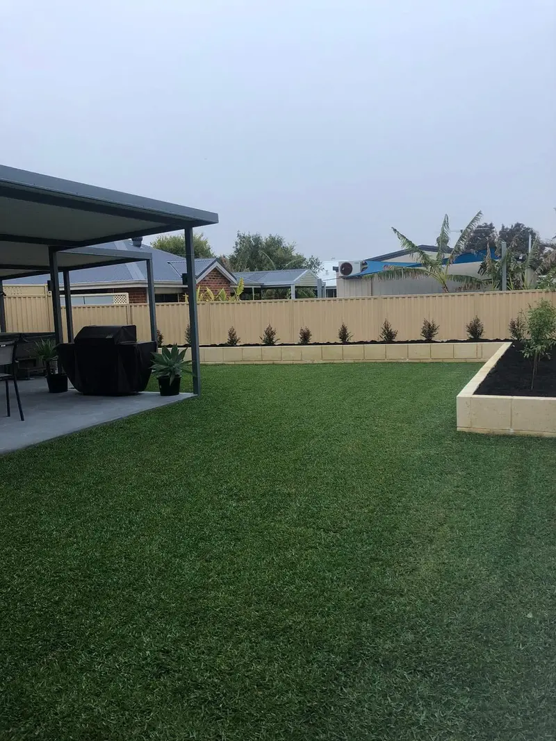 Artificial lawn backyard with patio
