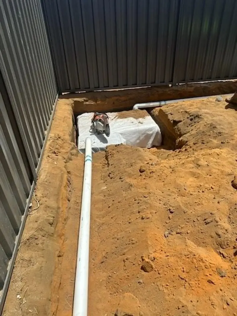 Soakwell excavation with stormwater pipe installed