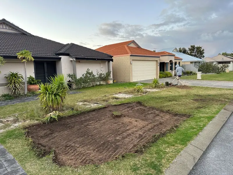 Old lawn area dug out ready for sand base