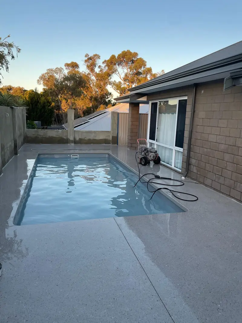 Rectangular pool with new aggregate surround
