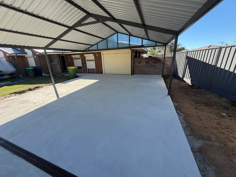 Concrete slab poured under carport