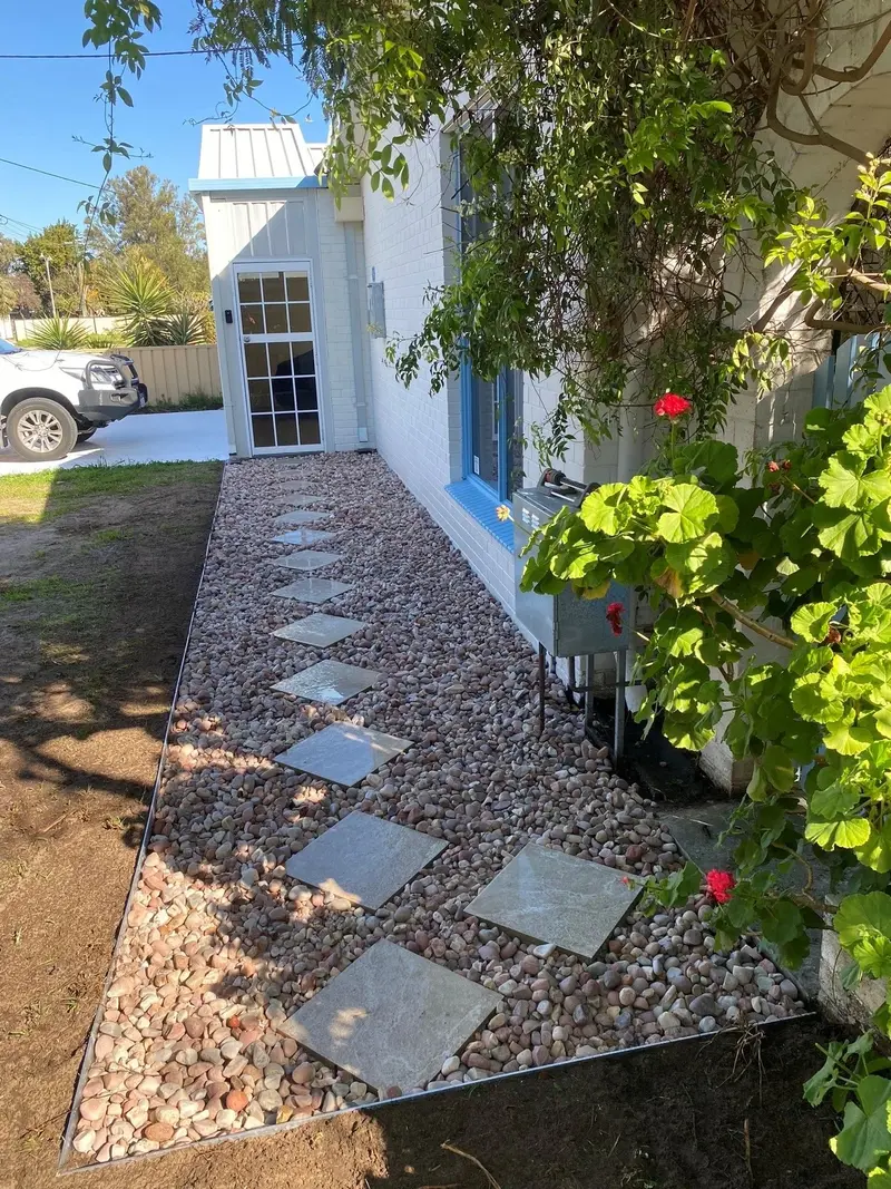 Stepping stone path in white pebble